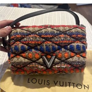 Louis Vuitton tweed GO-14 perfect condition never worn!